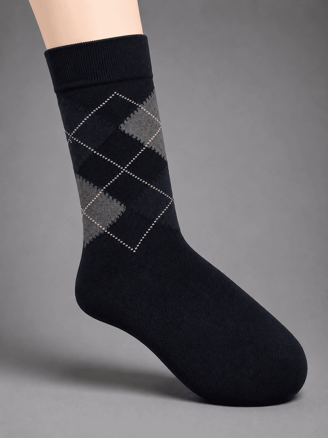 Men’s black combed cotton crew socks with classic navy and grey argyle diamond pattern for formal and smart-casual wear.